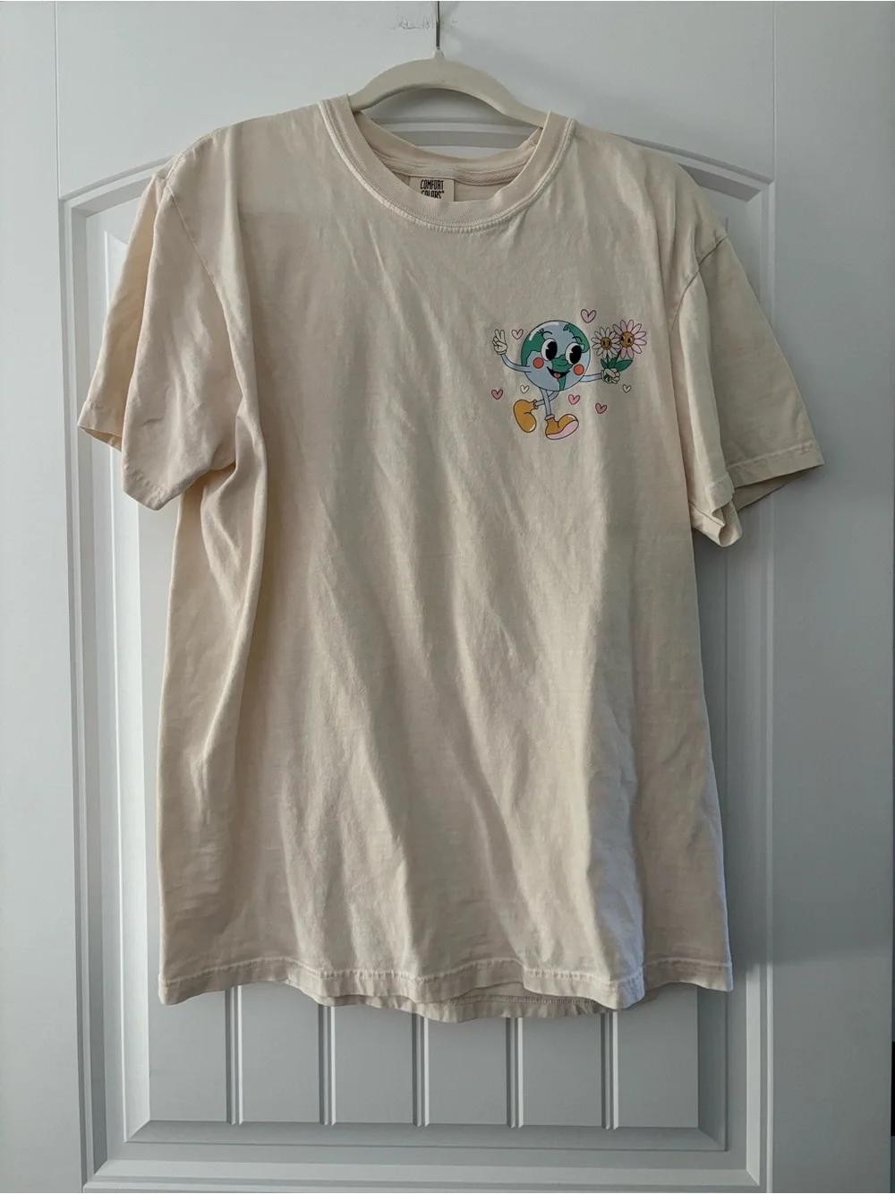 Comfort Colors Cream Short Sleeve Tee with Smiling Earth Graphic